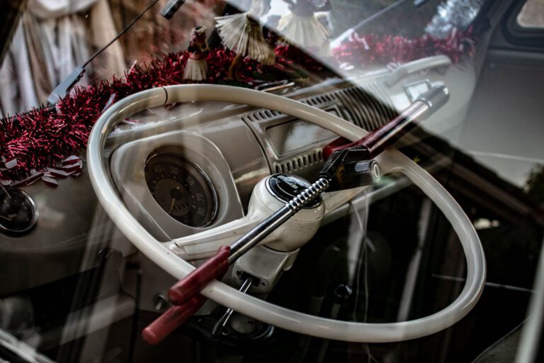 A steering wheel lock through fitted to the steering wheel of a vintage camper van.